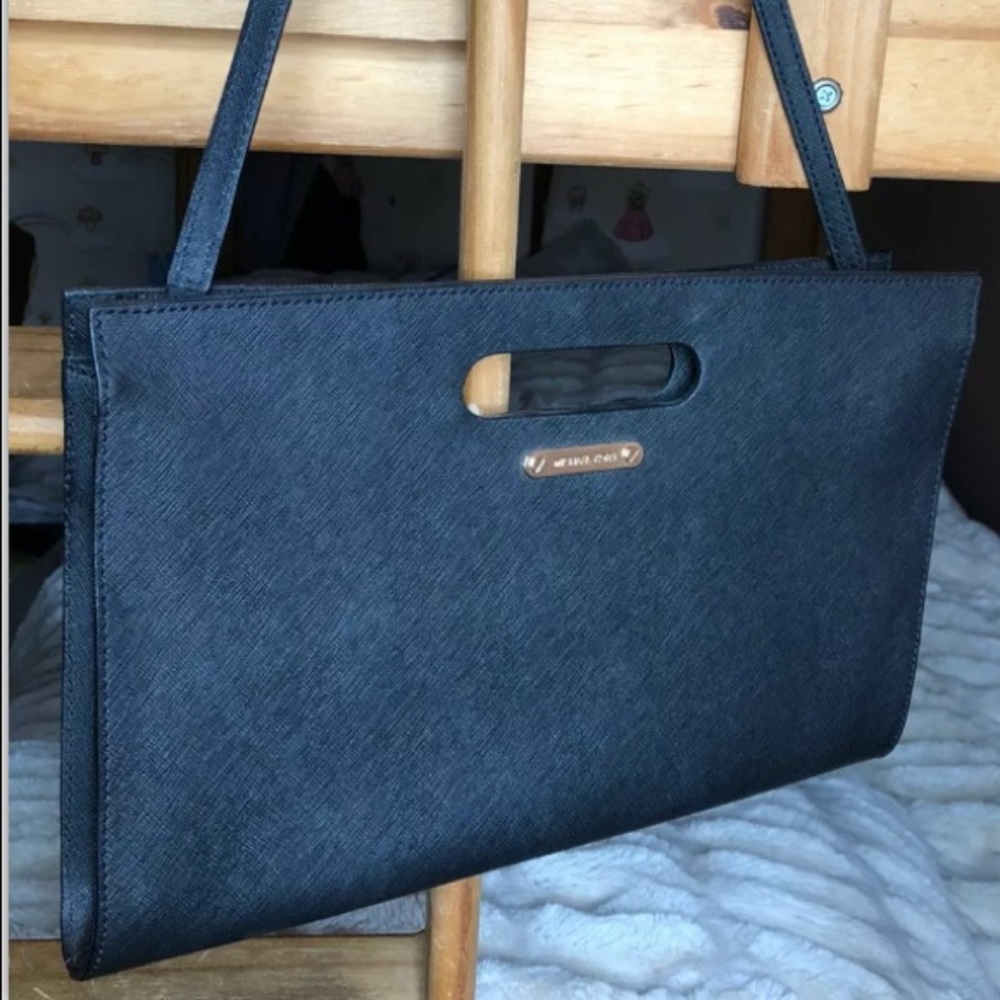 Sold! Michael Kors Clutch with detachable strap